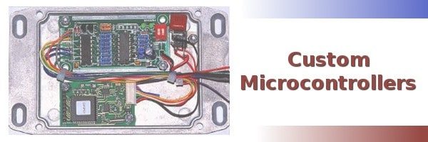 Microcontroller circuit board with connected wires, electronics components, and custom microcontroller project for industrial automation and embedded systems.